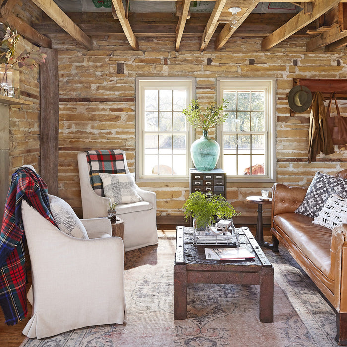 Cozy rustic living room with fireplace for seasonal home decorating
