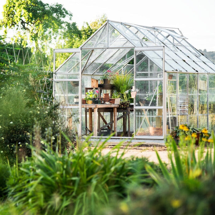 what direction should a greenhouse face