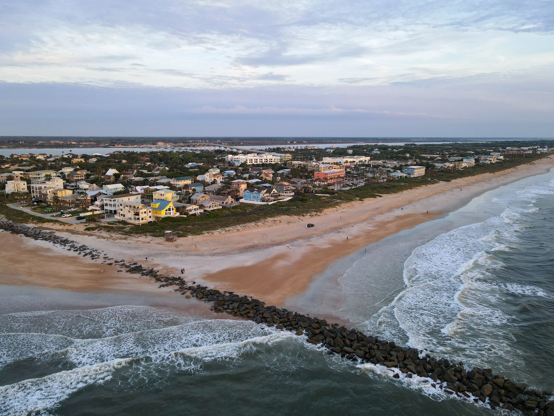 Coastal town beside the sea at sunset