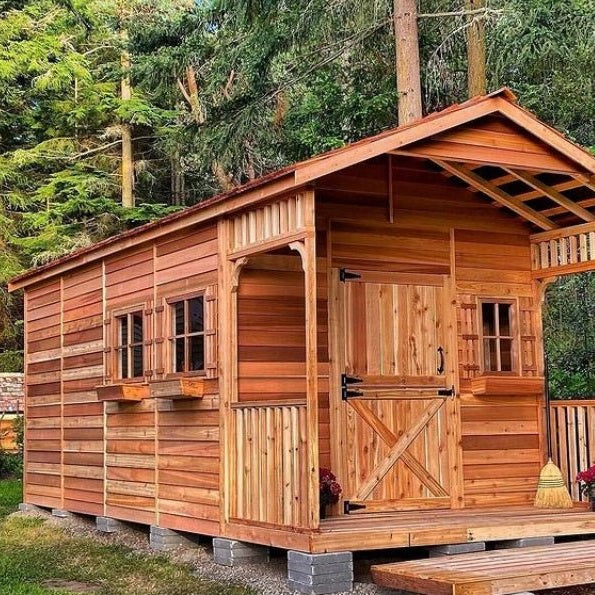 Cedarshed wood storage shed with a small front porch