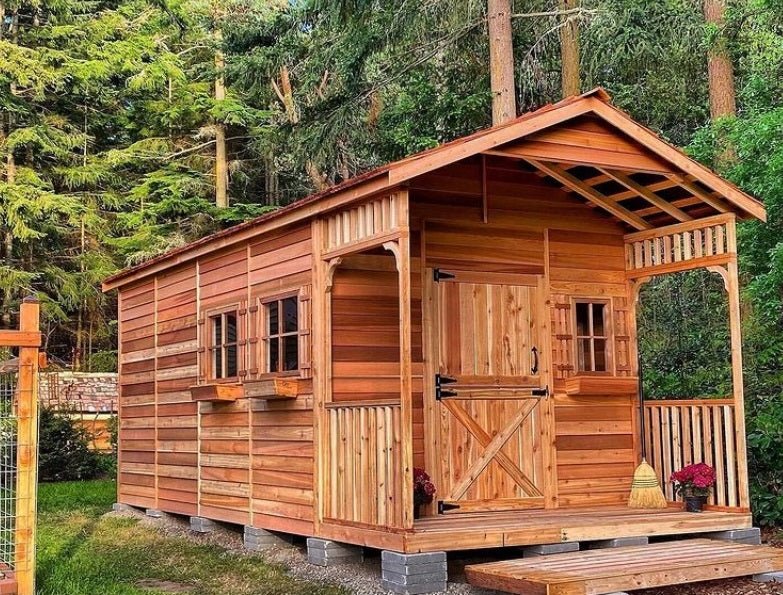 Cedarshed wood storage shed with a small front porch