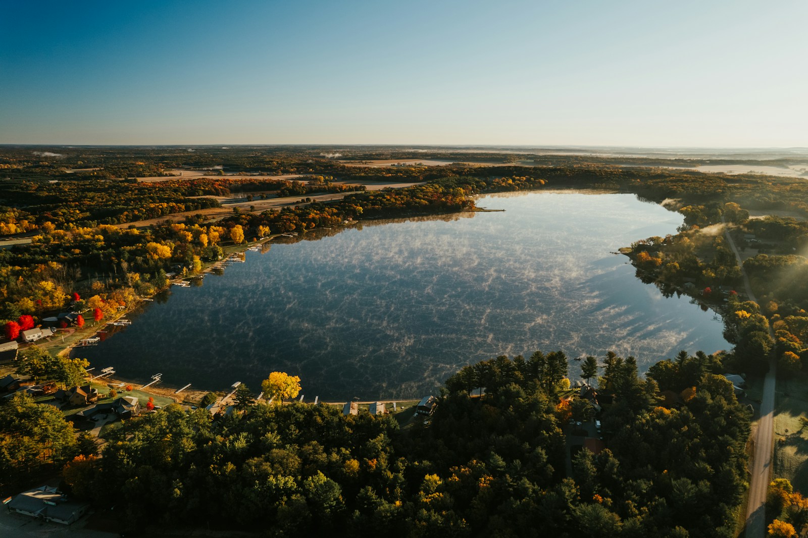 Aerial view of a wooded lake in Wisconsin