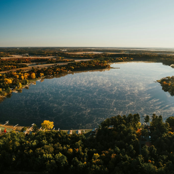 Aerial view of a wooded lake in Wisconsin