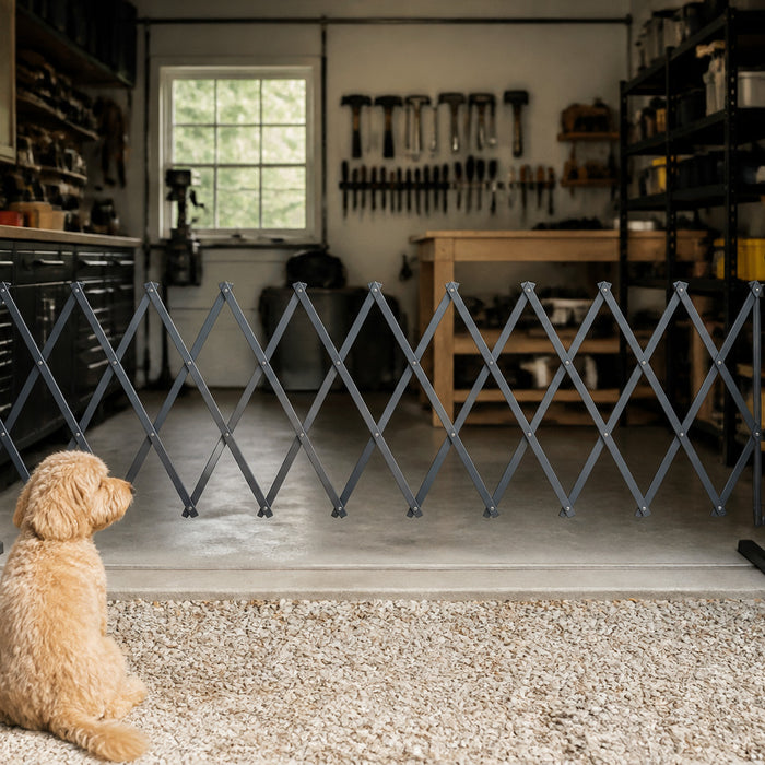 Expandable safety barrier blocking access to a home workshop