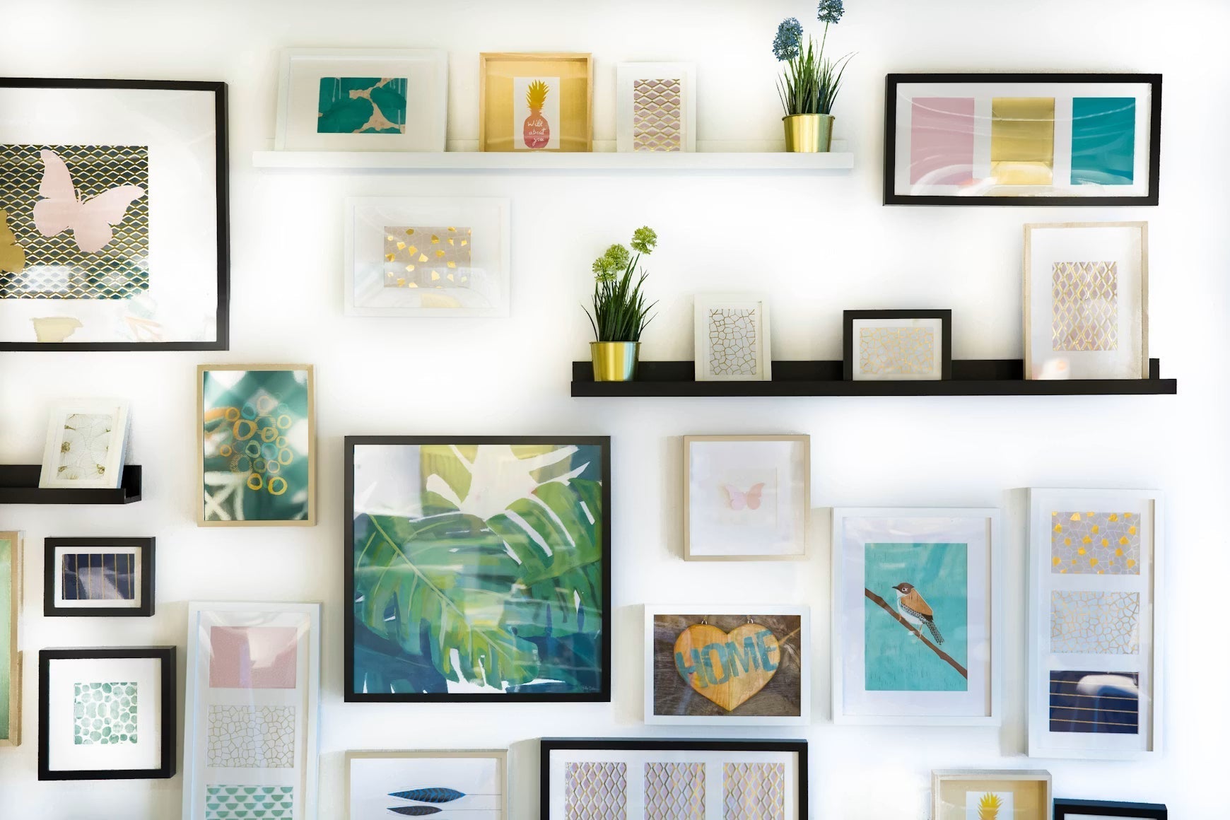 Gallery wall with framed artwork and floating shelves