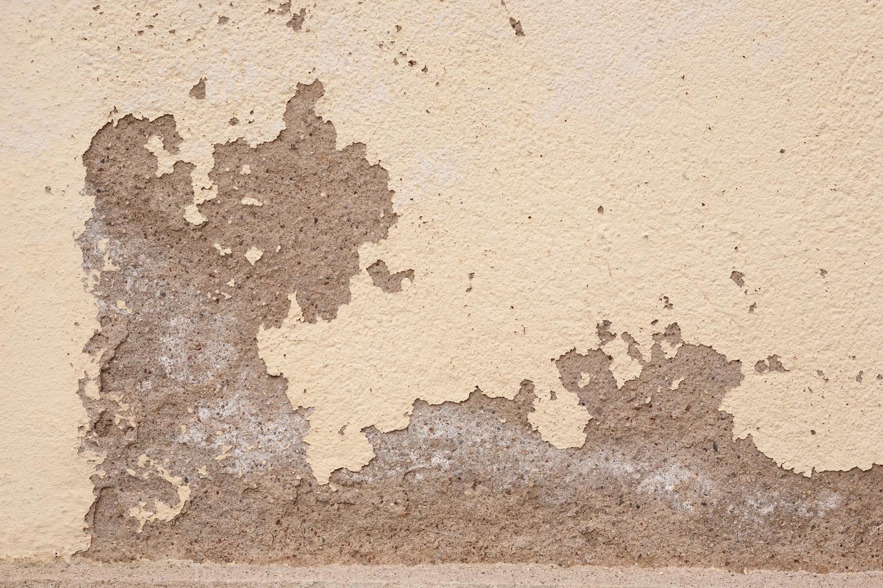 Close-up of a rough concrete foundation surface