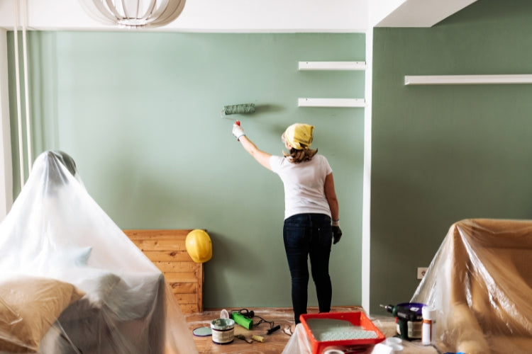 Homeowner wearing protective equipment while working on a DIY project