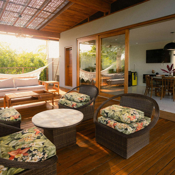 Covered outdoor patio with lounge and dining furniture