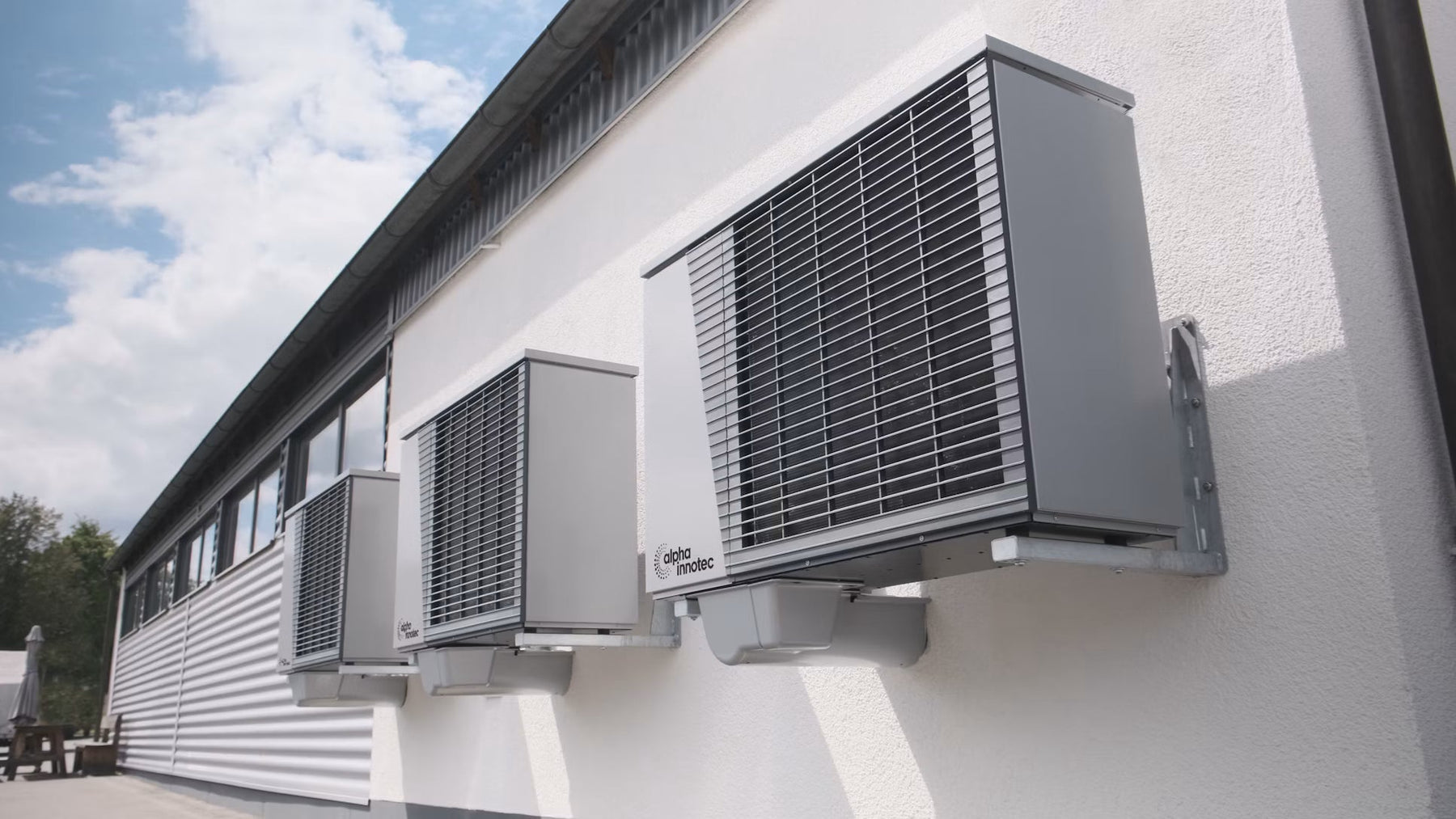 Outdoor air-conditioning units mounted along a home exterior