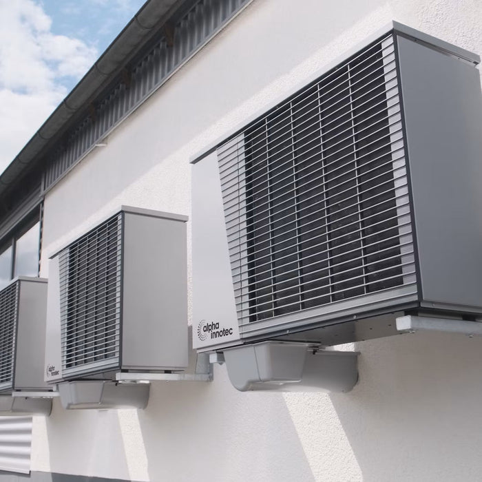 Outdoor air-conditioning units mounted along a home exterior