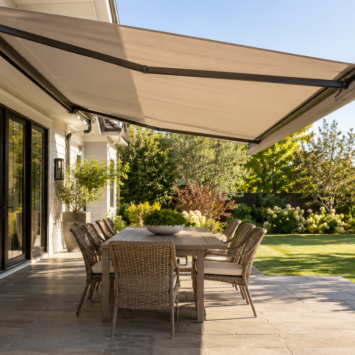 Retractable awning shading a sunny backyard patio
