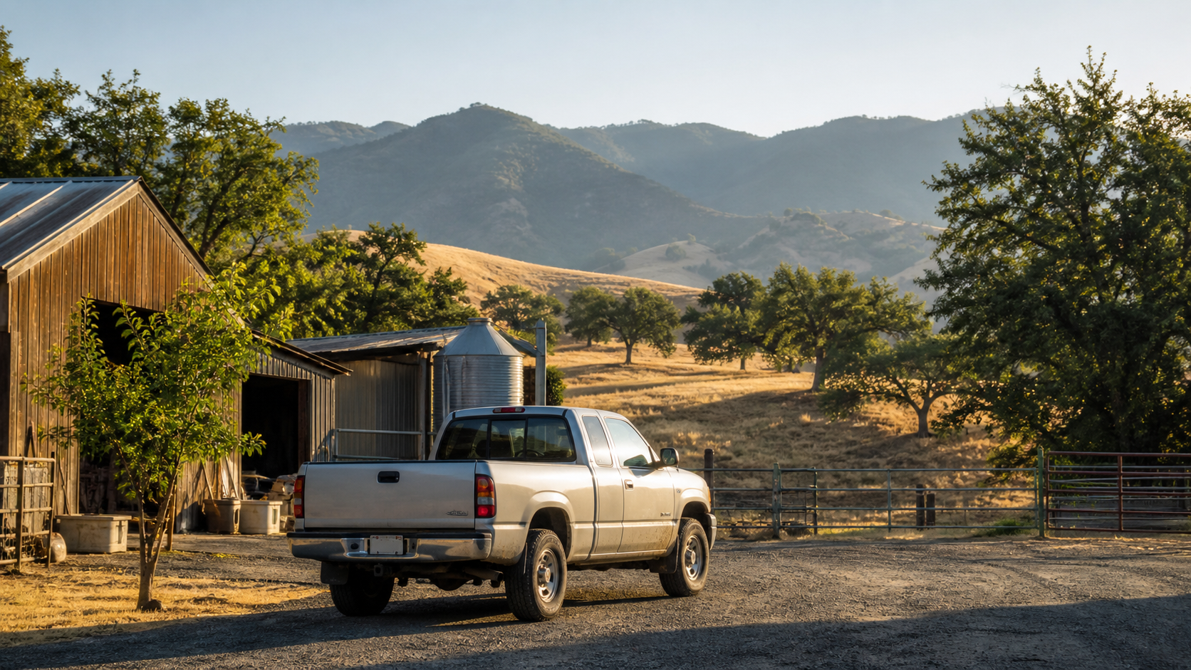 Pickup truck parked beside a rural California homestead