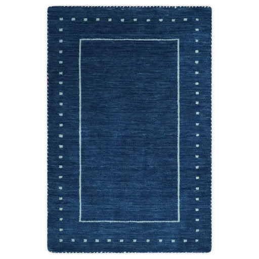Full front view of the rectangular Modern Solid Plane Blue rug on a white background