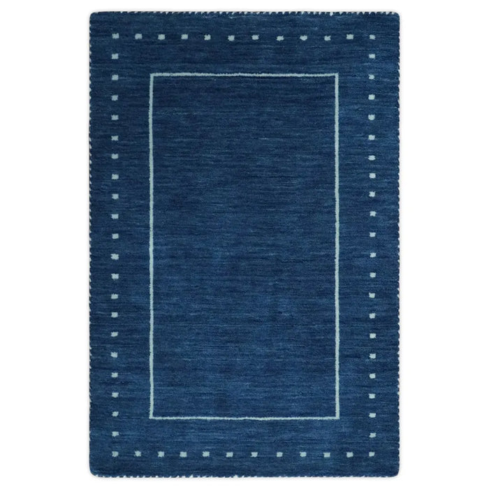 Full front view of the rectangular Modern Solid Plane Blue rug on a white background