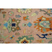 Peach rug field with large multicolor Oushak motifs