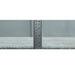 Side profile of hand knotted wool rug edge shown beside a ruler