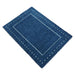 Elevated-angle view of the full rectangular blue rug on a white background