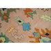 Close-up of peach pile with blue and orange motifs