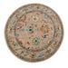 Full overhead view of round pink, peach, and gold floral Oushak rug