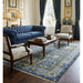 Oushak rug staged with a sofa in a living room