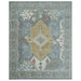 Beige, blue and ivory hand knotted wool rug with blue border and central beige geometric medallion