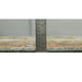 Side profile of the Blue and Brown Heriz Serapi rug shown beside a ruler