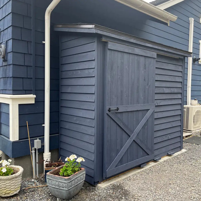 Cedarshed Bayside backyard storage shed view showing cedar lean-to shed installation.