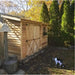 Cedarshed Bayside wood storage shed kit shown with cedar lean storage design.