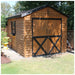 Front exterior view of the Cedarshed Rancher wood storage shed beside a garden path