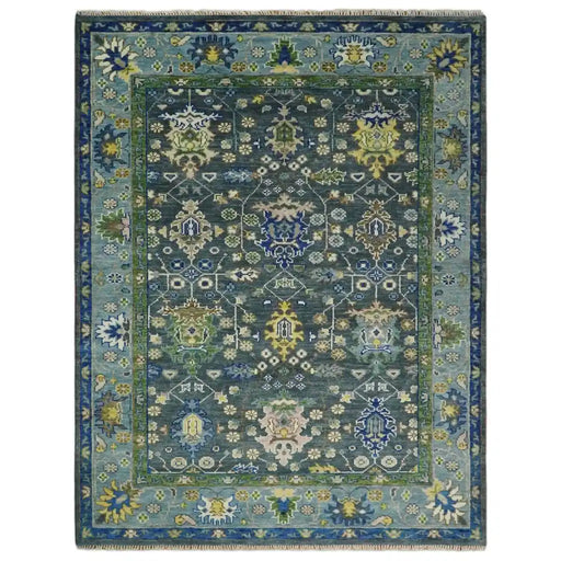 Full view of the 8x10 rectangular Oushak rug with an antique-inspired pattern
