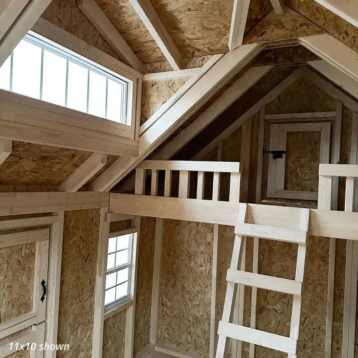 Little Cottage Co Craftsman Playhouse with a wooden attic with a ladder leading to a loft.