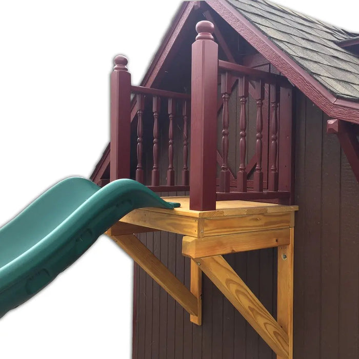 Wooden Little Cottage Co Craftsman Playhouse with a green slide on a white background