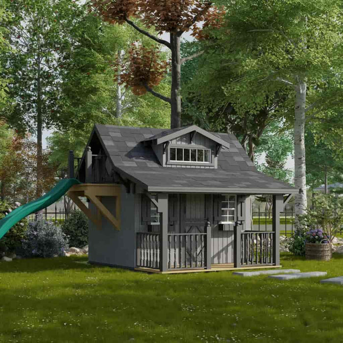 Little Cottage Co Craftsman Playhouse with a green slide in a garden setting