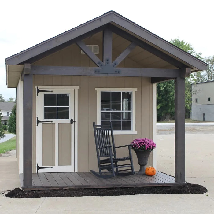 Front view of the EZ-Fit 10x14 Woodsman Shed Quick Ship with porch and entry door.