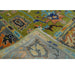 Folded corner showing the patterned rug face, fringe, and woven backing.