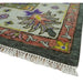 Rug corner with ivory border and fringe detail