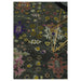 Traditional floral rug pattern detail beside a furniture leg