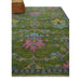 One end of the rug with fringe visible