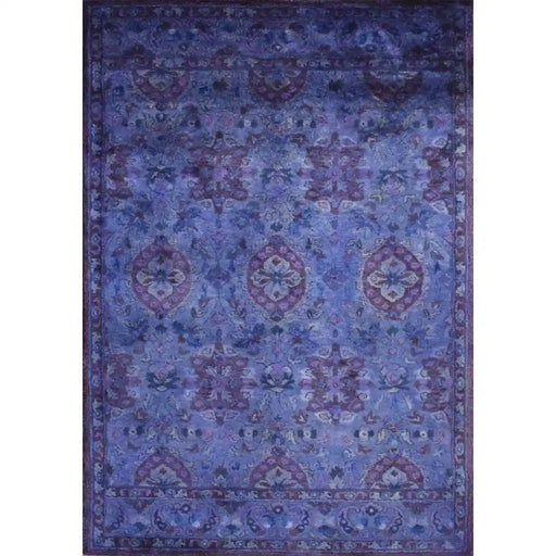 Overhead view of the full rectangular rug with traditional pattern and border