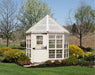 little cottage company 8x8 octagon greenhouse in a garden