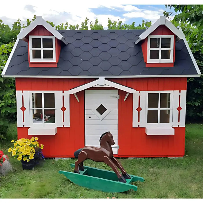 Palmako Marie 9x6 red playhouse kit with a black roof and white trim, with a rocking horse and flowers in front