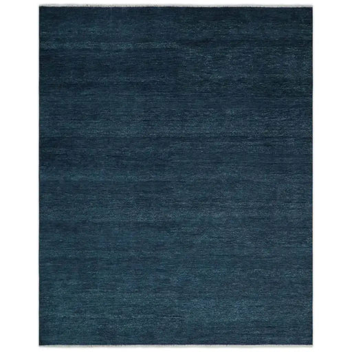 Overhead view of The Rug Decor Midnight Blue solid rectangular hand-knotted wool rug