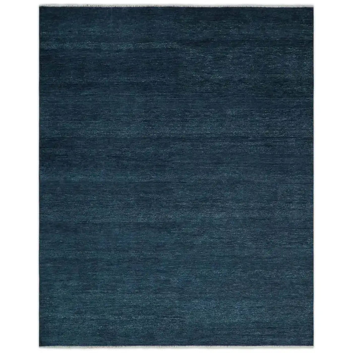Overhead view of The Rug Decor Midnight Blue solid rectangular hand-knotted wool rug