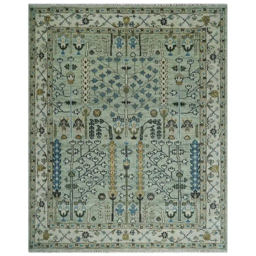 Moss Green and Ivory Tree of Life wool rug on a white background
