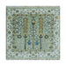 Near-square full rug view with floral and vine motifs
