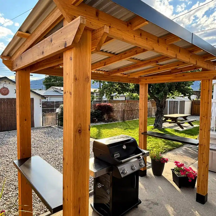 Outdoor Living Today 8x5 Grill Gazebo with a grill underneath in a backyard setting