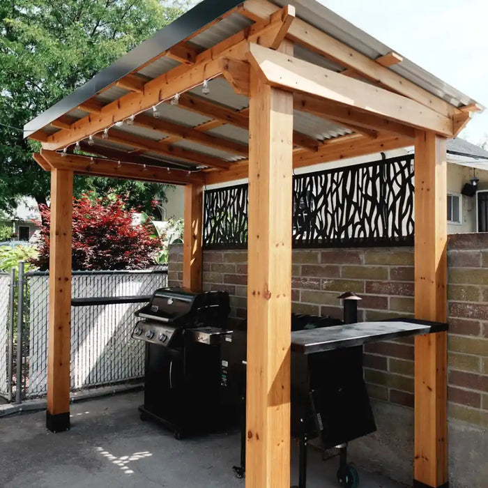 Outdoor Living Today 8x5 Grill Gazebo with a grill and table on an outdoor patio.