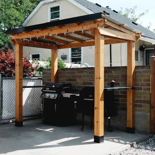 Outdoor Living Today 8x5 Grill Gazebo with outdoor grills and furniture on a patio
