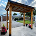 Outdoor Living Today 8x5 Grill Gazebo with plants on a patio area