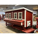Front quarter view of the red and white OverEZ Jumbo Chicken Coop.